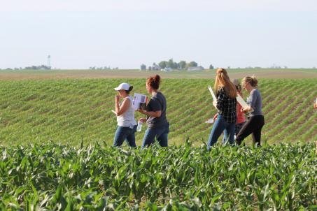 People standing together in an open field